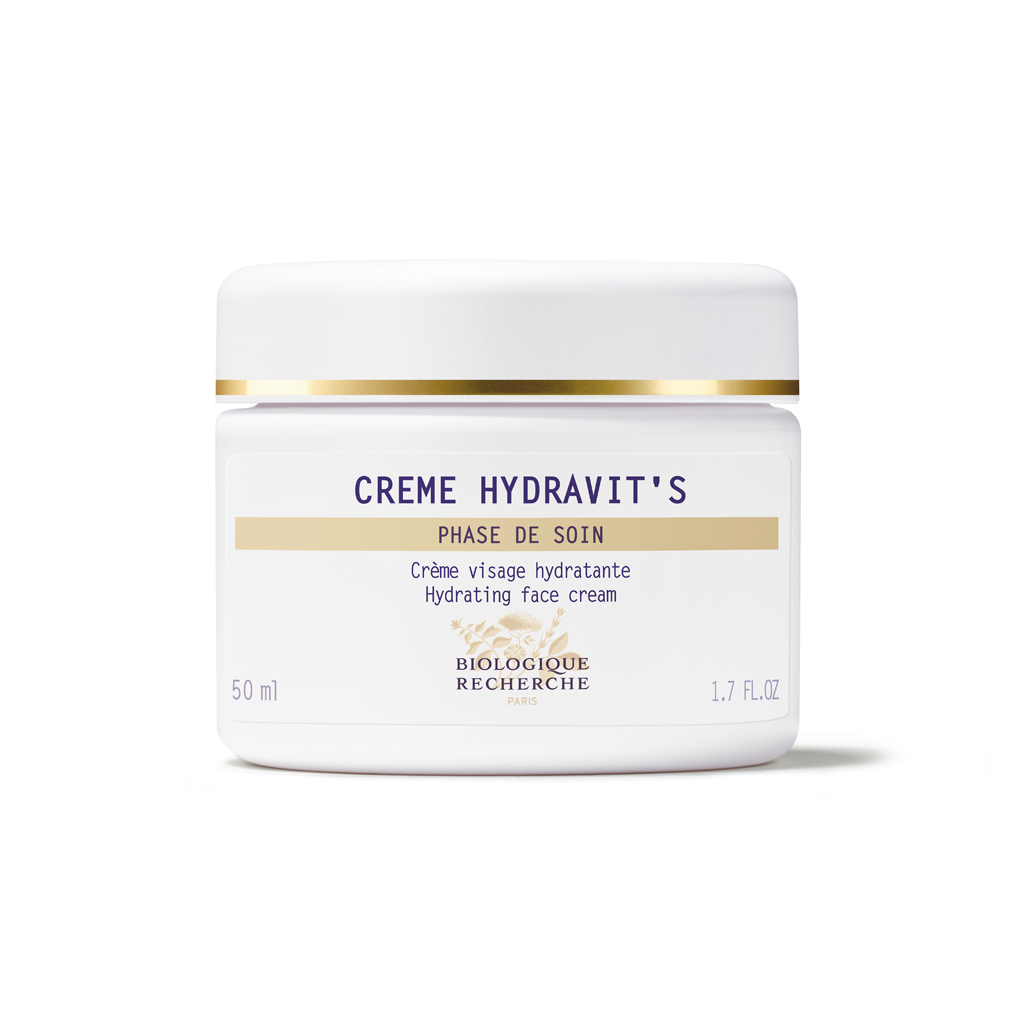 White jar of Crème Hydravit's with gold accents on a white background