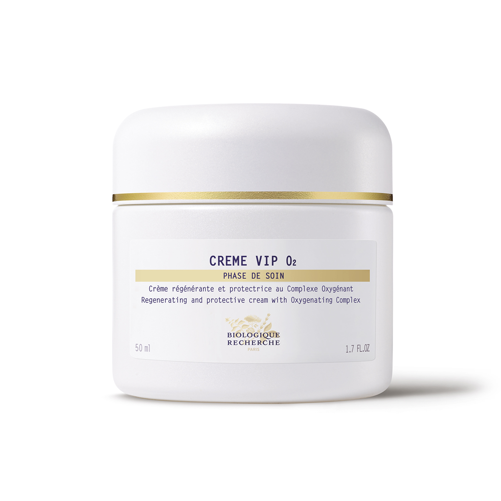 White jar of Crème VIP O2 with gold accents on a white background