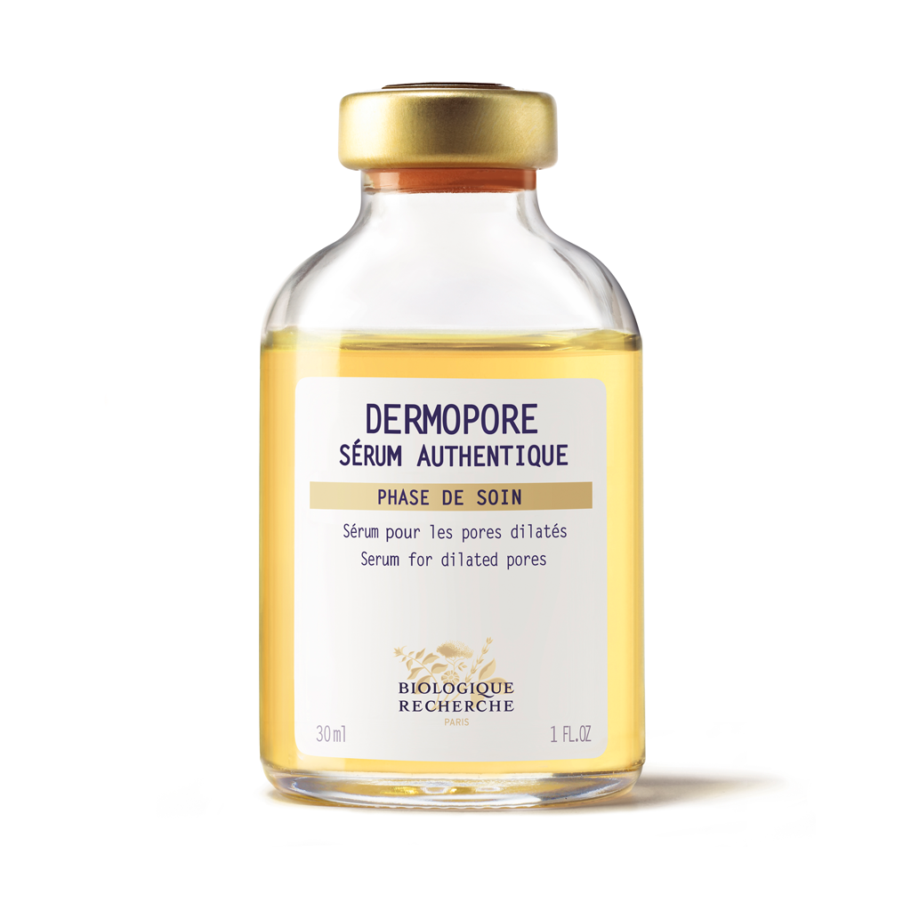 Dermopore serum bottle with gold cap on a white background