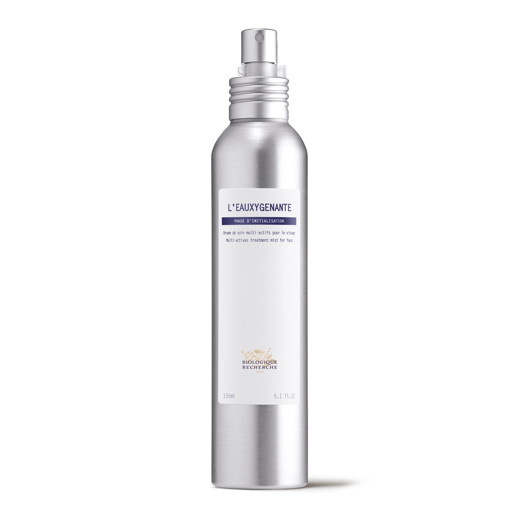 Silver bottle with a white label on a white background