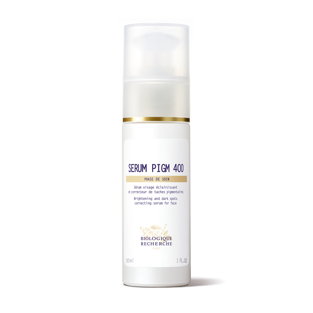 Skincare serum bottle labeled 'Serum Pigm 400' on a white background