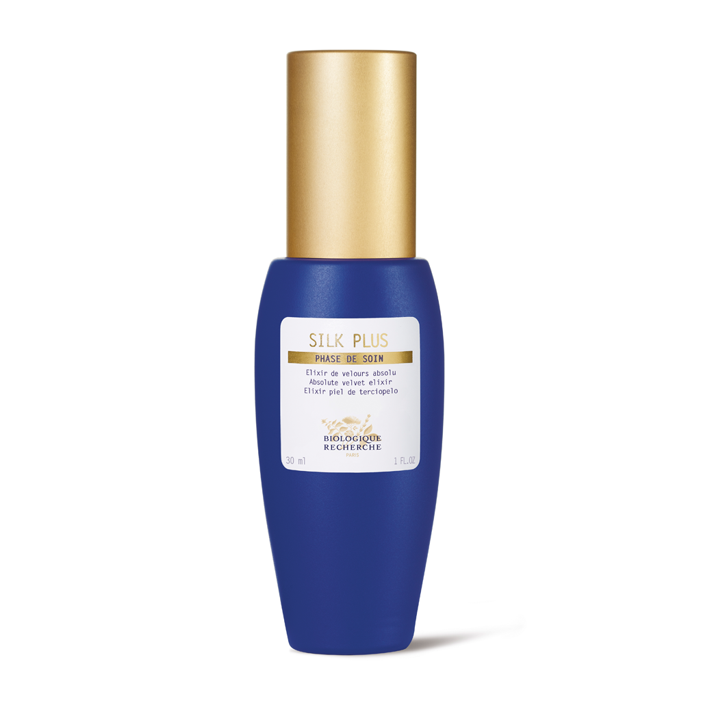 Blue skincare bottle with gold cap on a white background