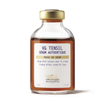 Glass bottle with gold cap labeled 'VG TENSIL Sérum Authentique' on a white background